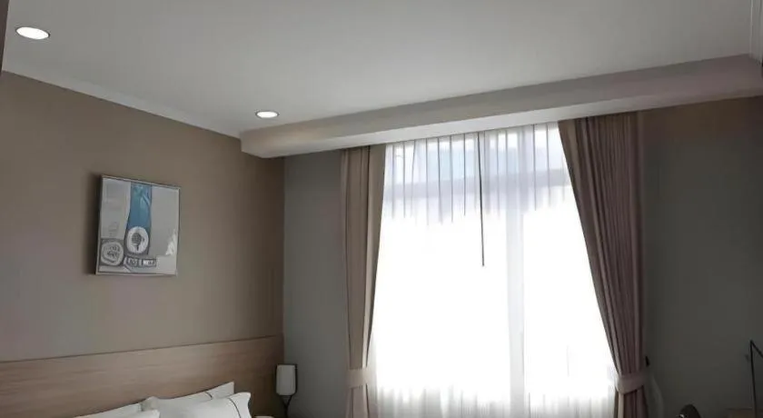 Bed in One Vientiane Hotel