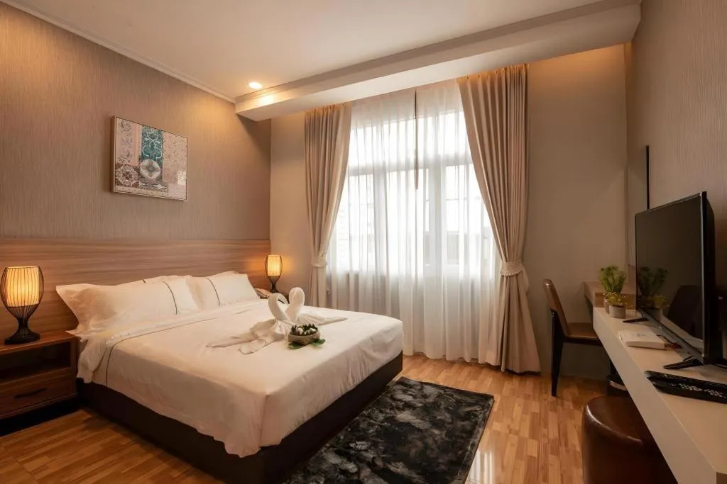 Bed in One Vientiane Hotel