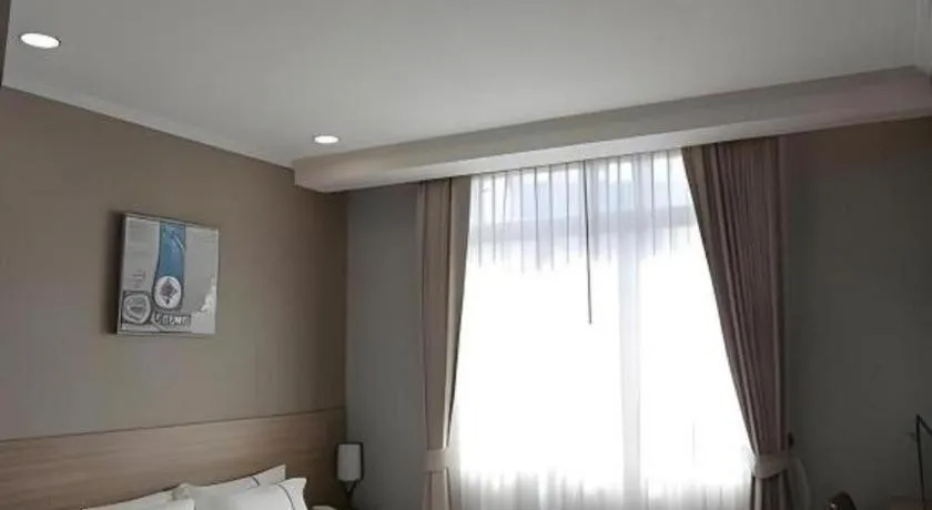 Bed in One Vientiane Hotel