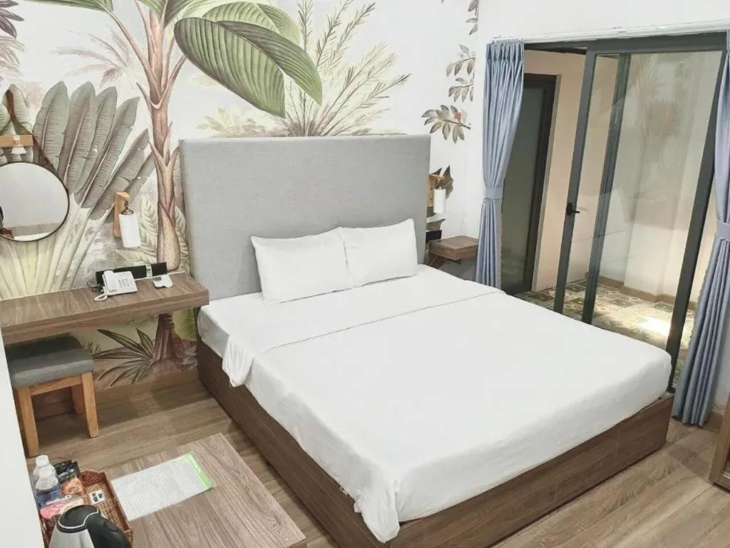 Bed in Green Oasis Hotel