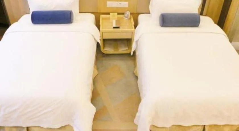 Bed in Shanghai Fuyue Hotel