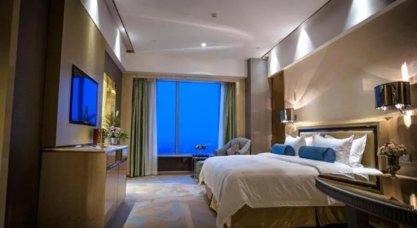 Bed in Shanghai Fuyue Hotel