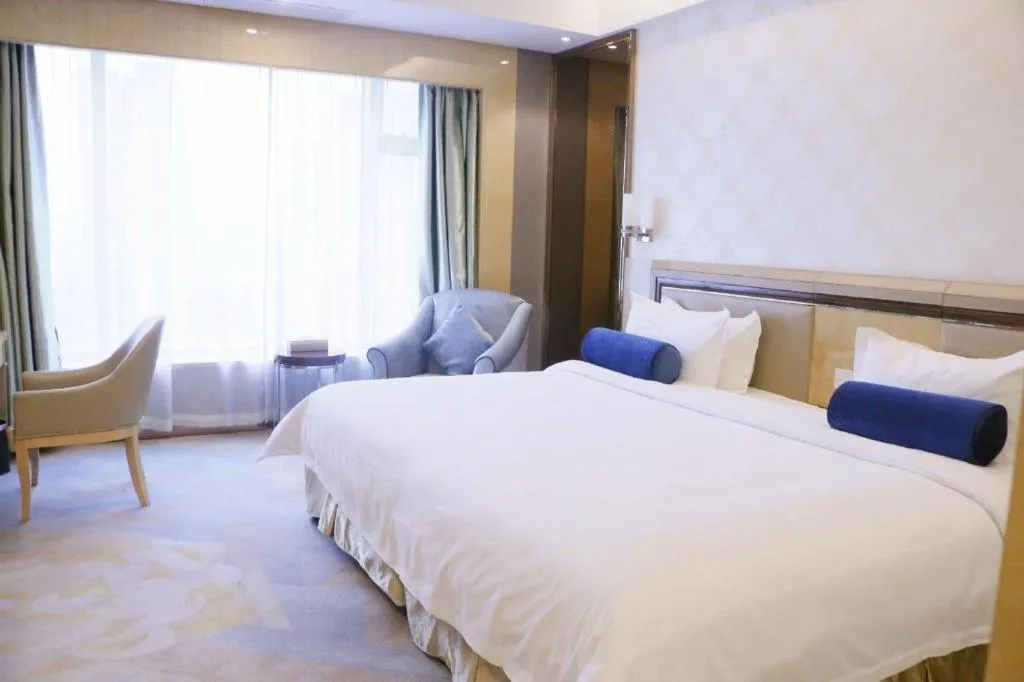 Bed in Shanghai Fuyue Hotel