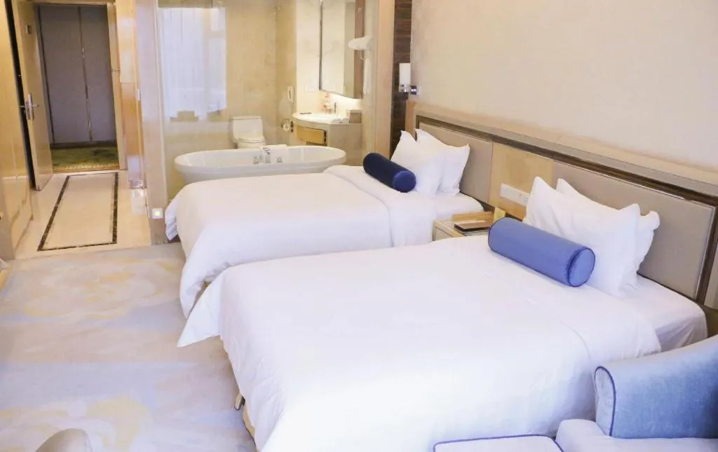 Bed in Shanghai Fuyue Hotel