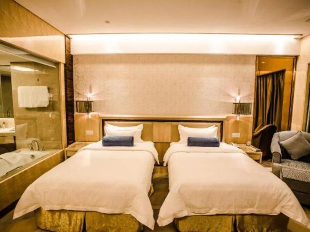 Bed in Shanghai Fuyue Hotel