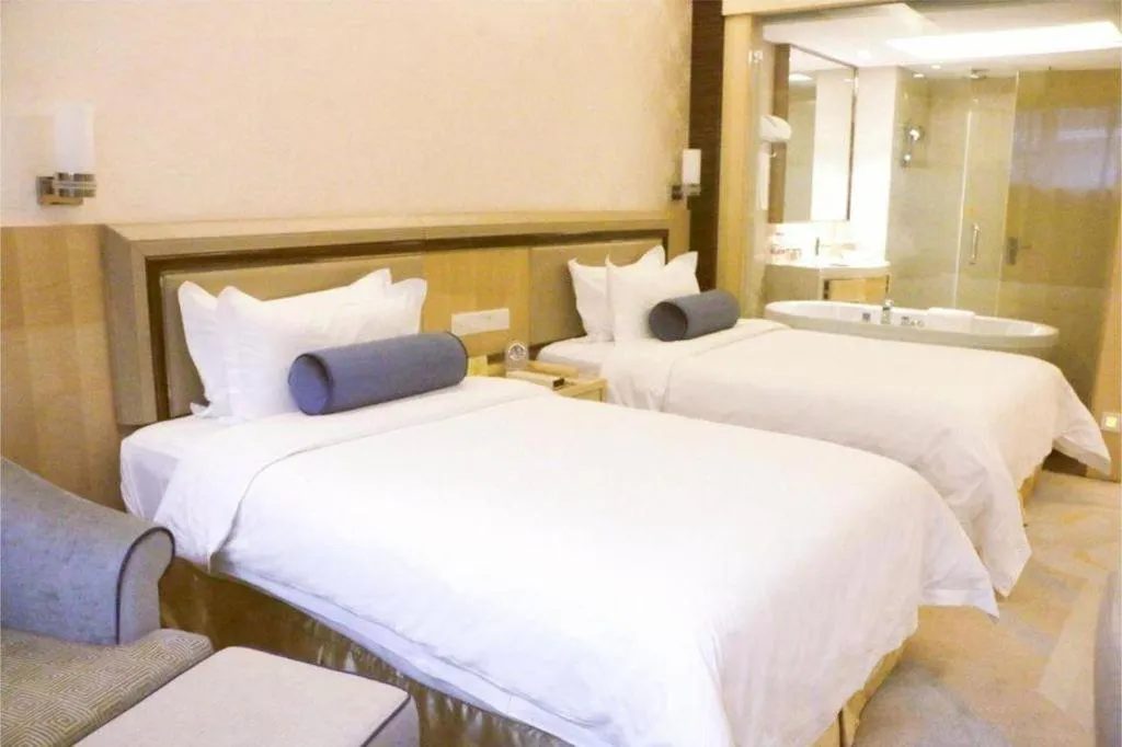 Bed in Shanghai Fuyue Hotel