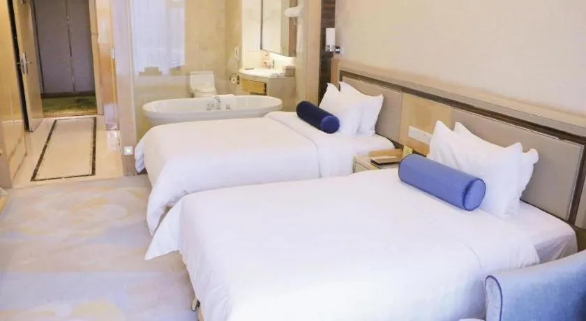 Bed in Shanghai Fuyue Hotel