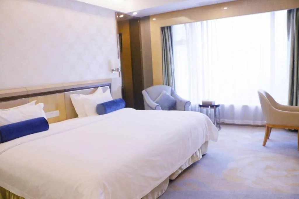 Bed in Shanghai Fuyue Hotel