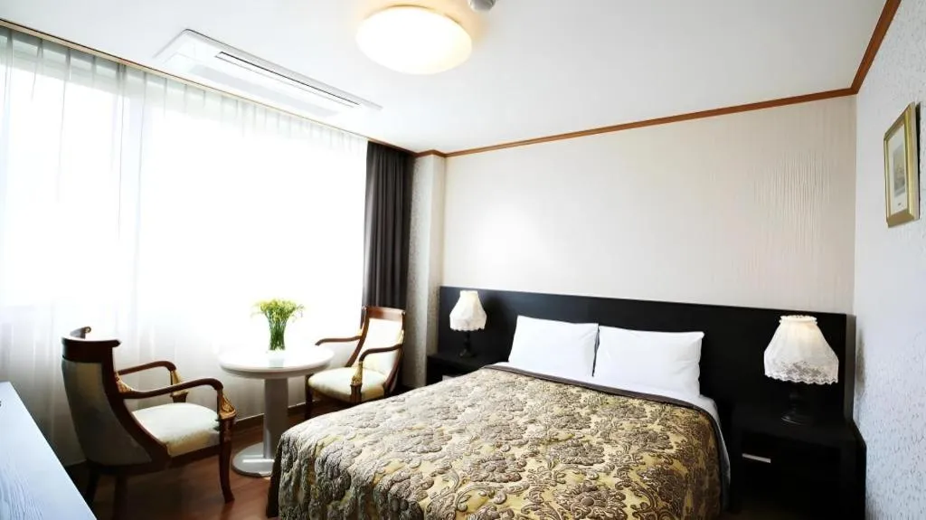 Bed in Danyang tourist hotel Edelweiss