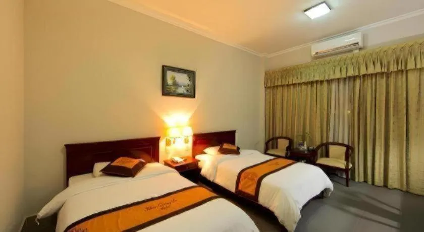 Bed in Khan Quang Do Hotel
