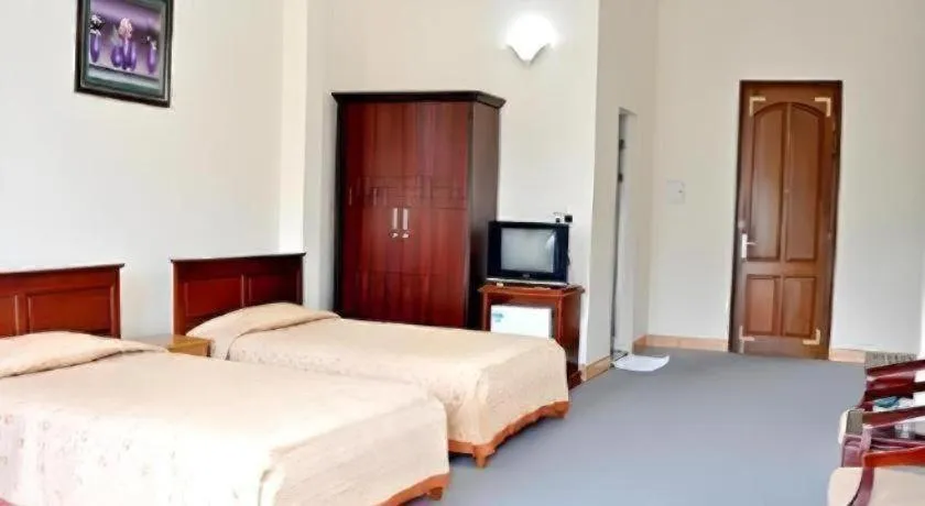 Bed in Khan Quang Do Hotel