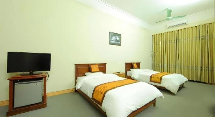 Bed in Khan Quang Do Hotel