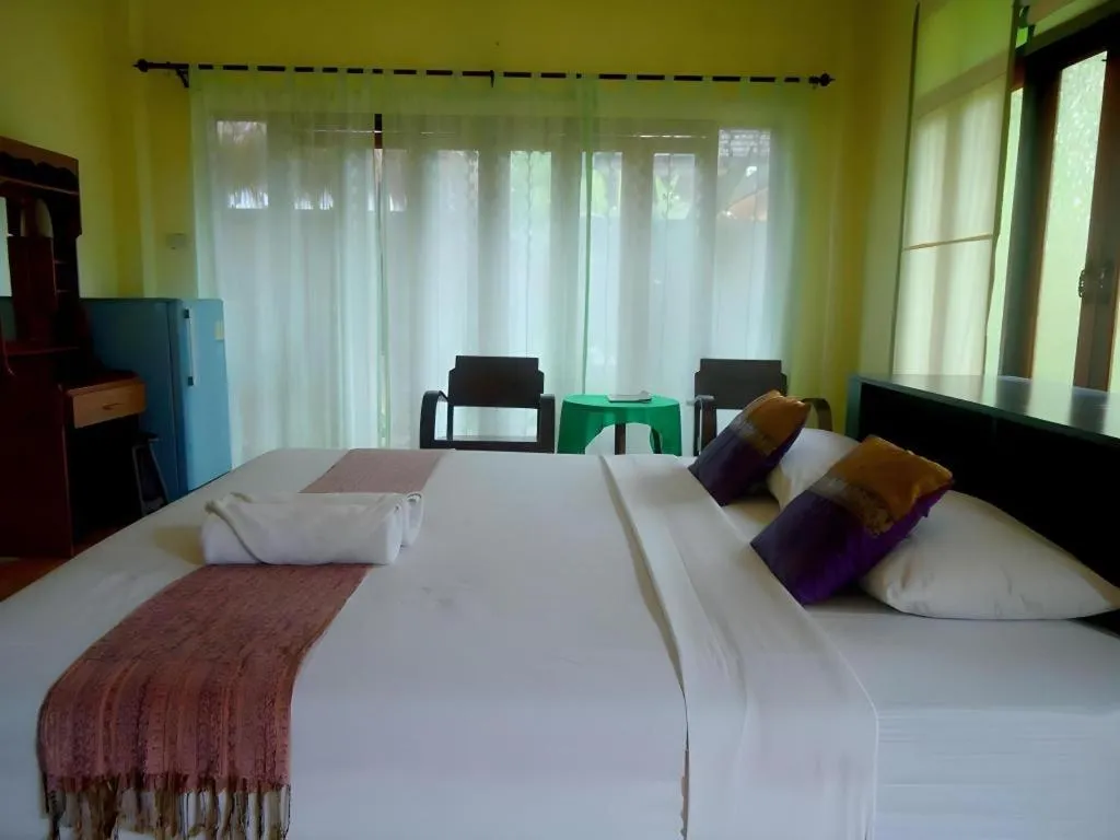 Bed in Aroma Pai Spa Hotel