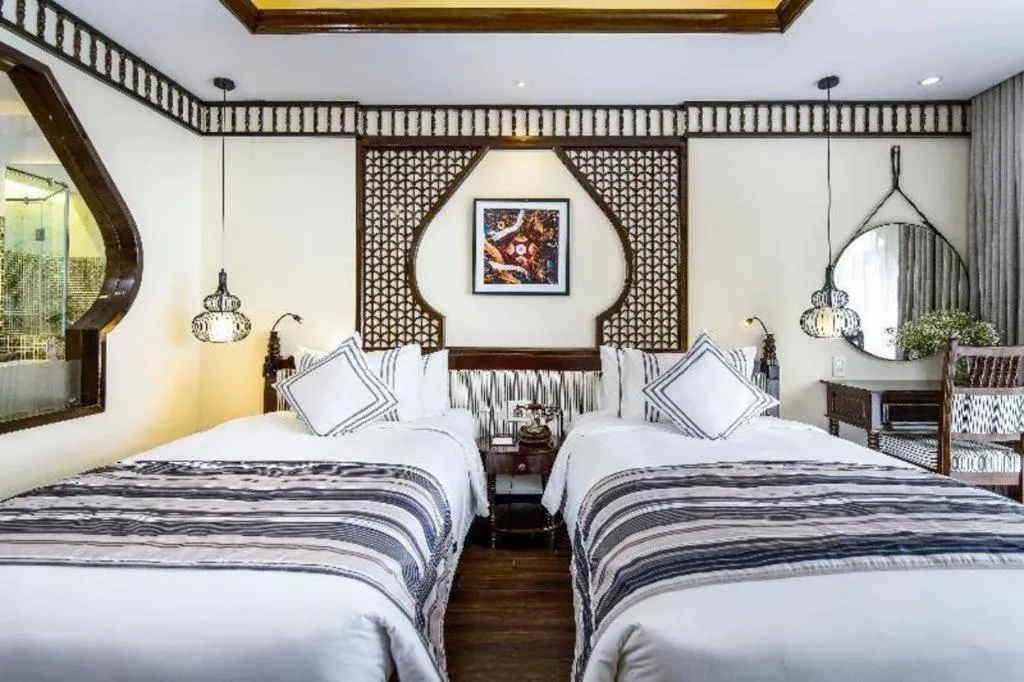 Bed in Le Pavillon Hoi An Paradise Hotel & Spa