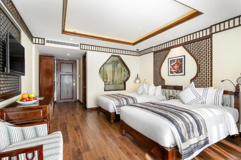 Bed in Le Pavillon Hoi An Paradise Hotel & Spa