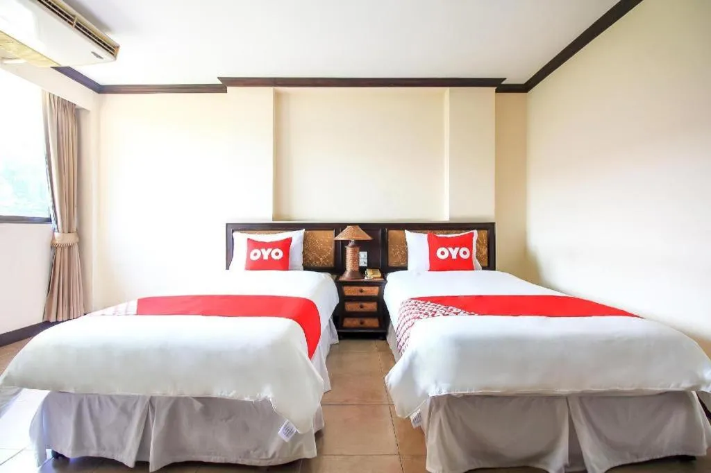 Bed in OYO 383 White inn hotel