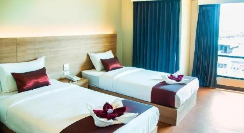 Bed in ATK HATYAI HOTEL