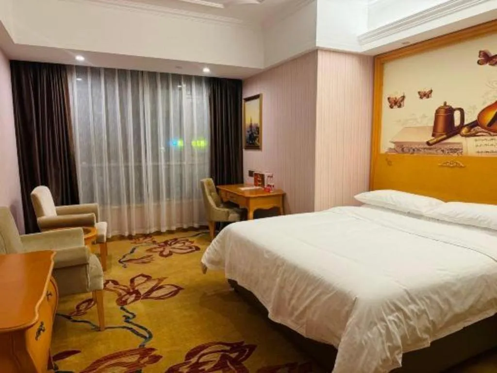 Bed in Vienna Hotel Guangdong Xinyi Jiaoyucheng River View