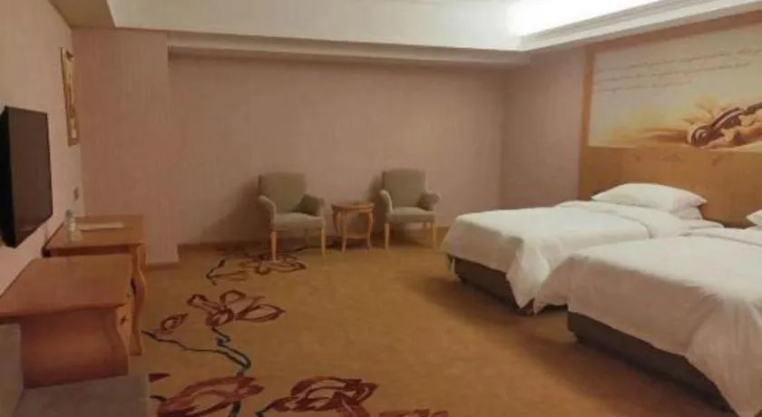 Bed in Vienna Hotel Guangdong Xinyi Jiaoyucheng River View
