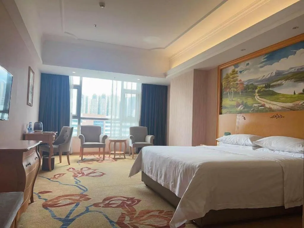 Bed in Vienna Hotel Guangdong Xinyi Jiaoyucheng River View
