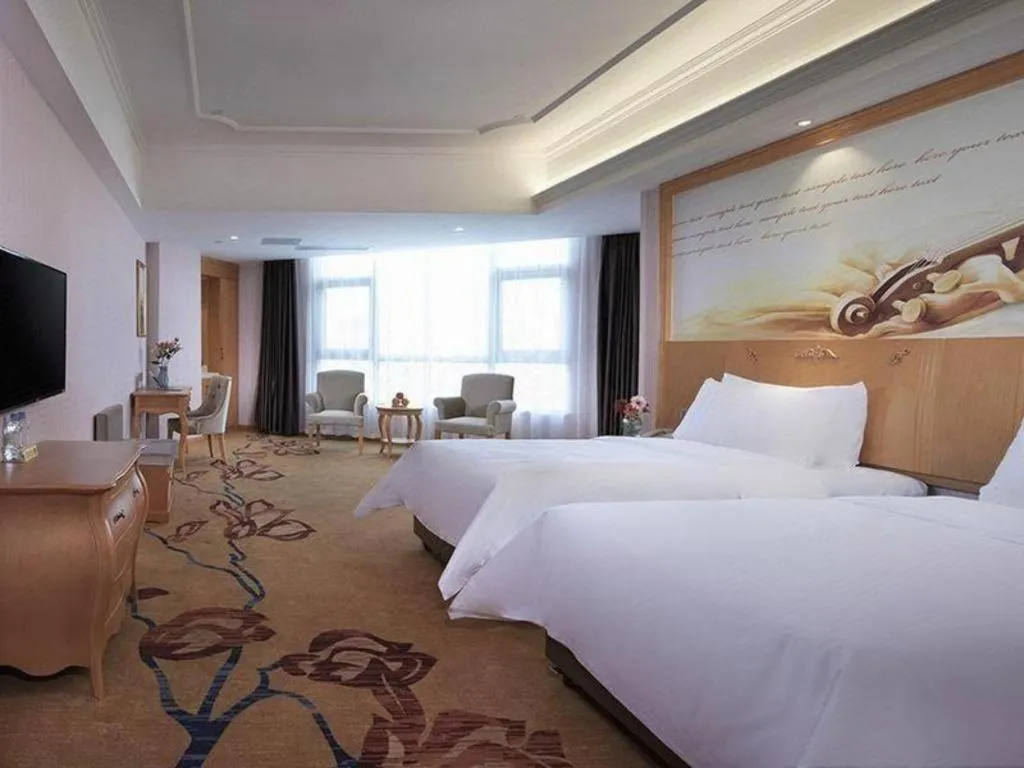 Bed in Vienna Hotel Guangdong Xinyi Jiaoyucheng River View