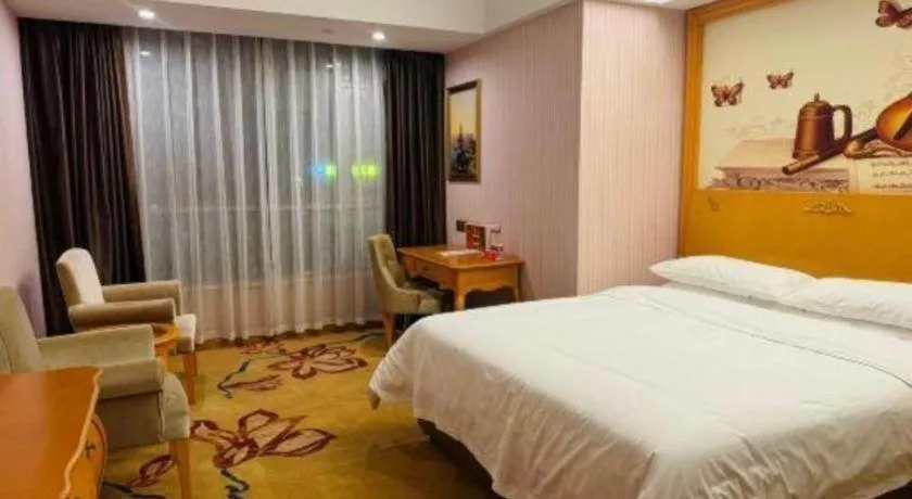 Bed in Vienna Hotel Guangdong Xinyi Jiaoyucheng River View