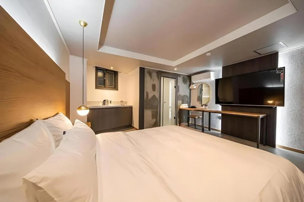 Bed in No 25 Hotel Songtan