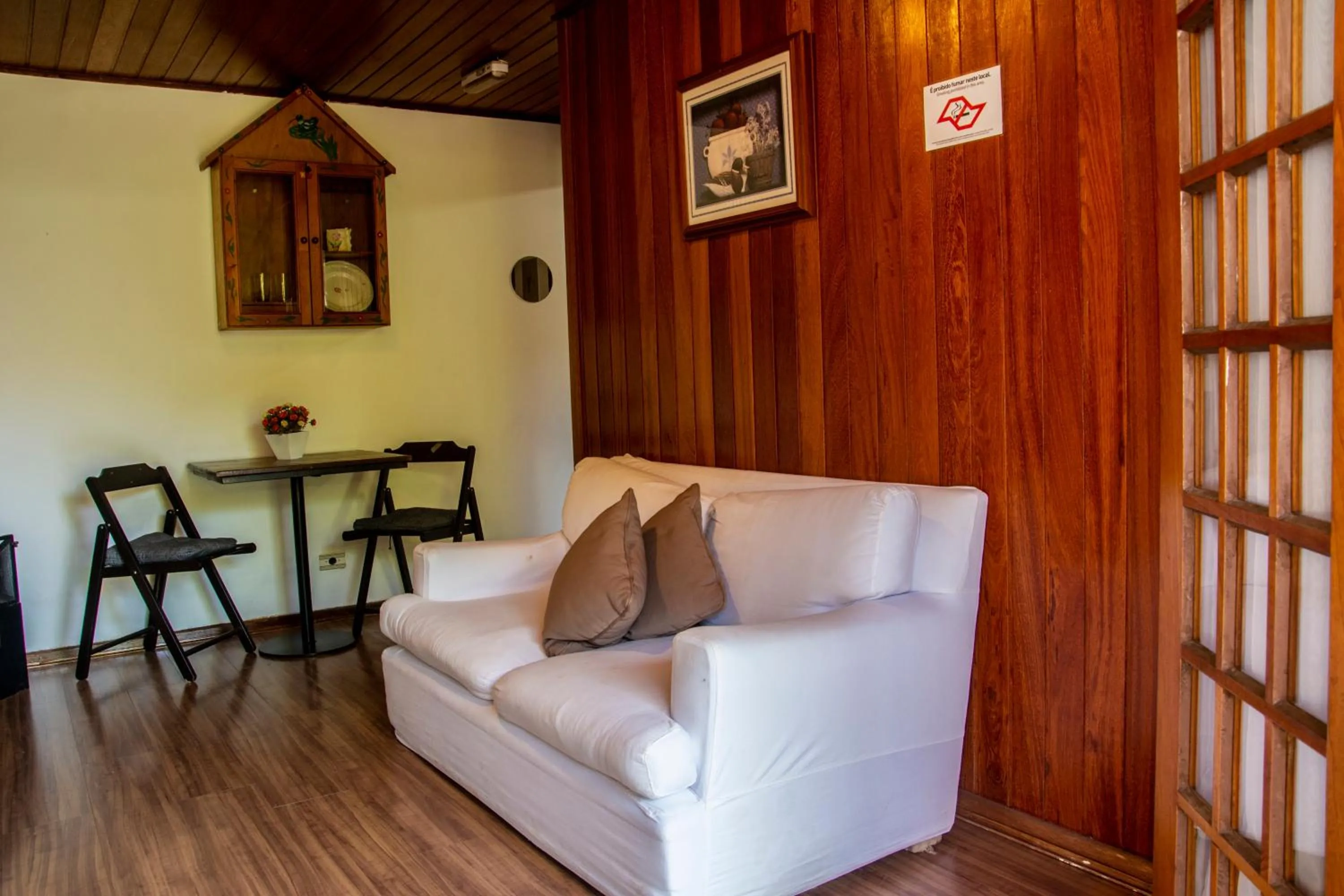 Living room in Pousada Recanto Ninho Verde Chalés