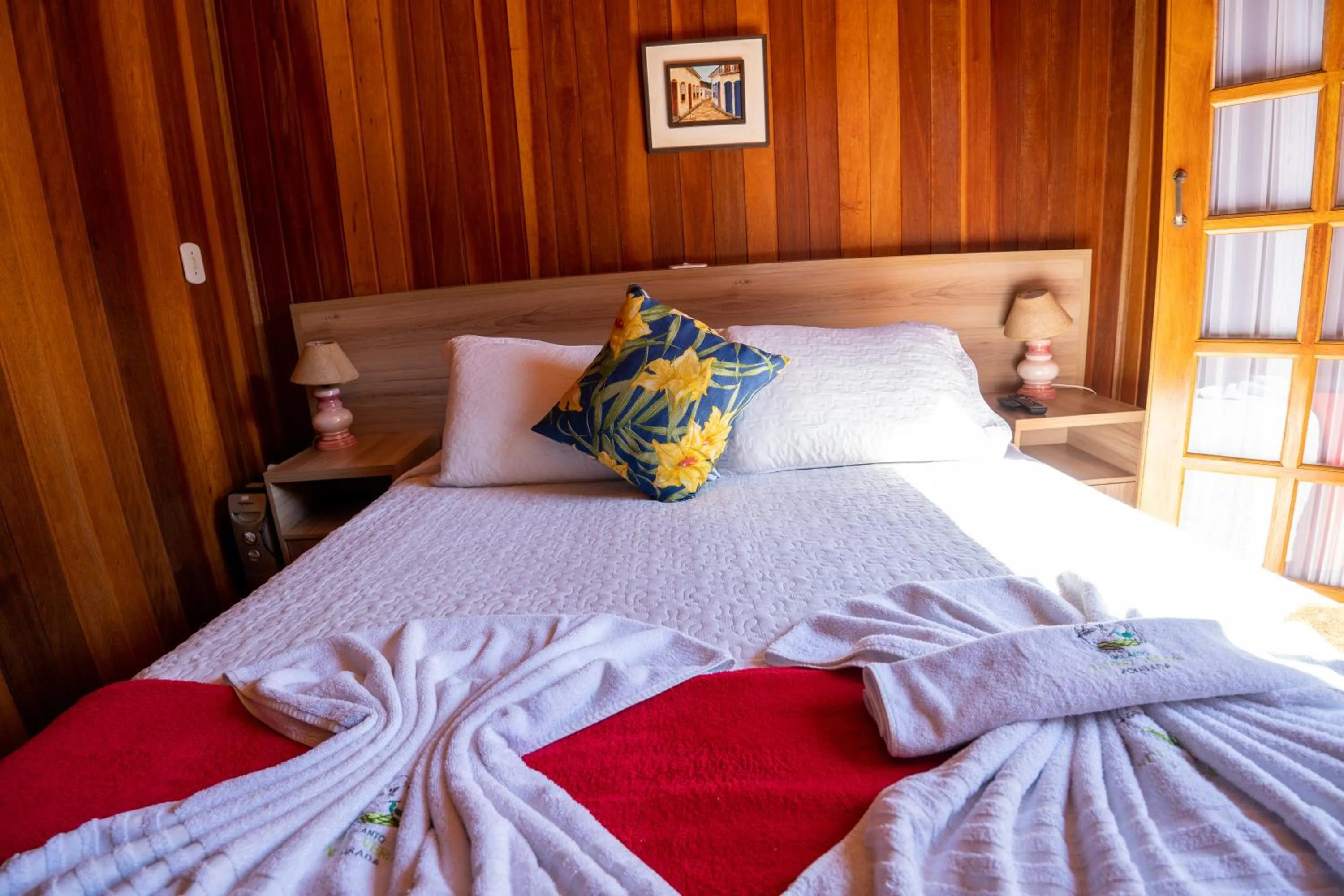 Bed in Pousada Recanto Ninho Verde Chalés