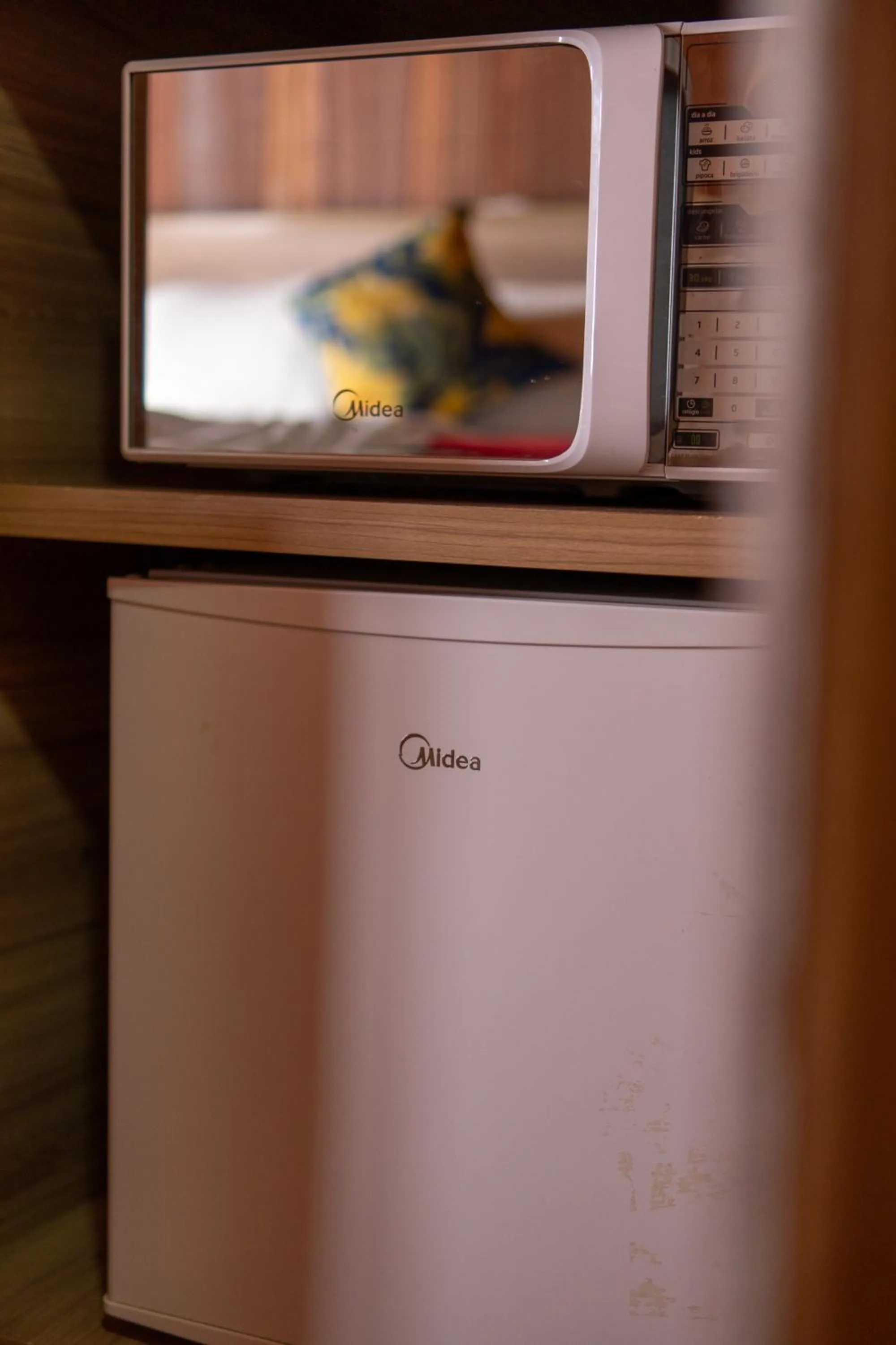 microwave in Pousada Recanto Ninho Verde Chalés