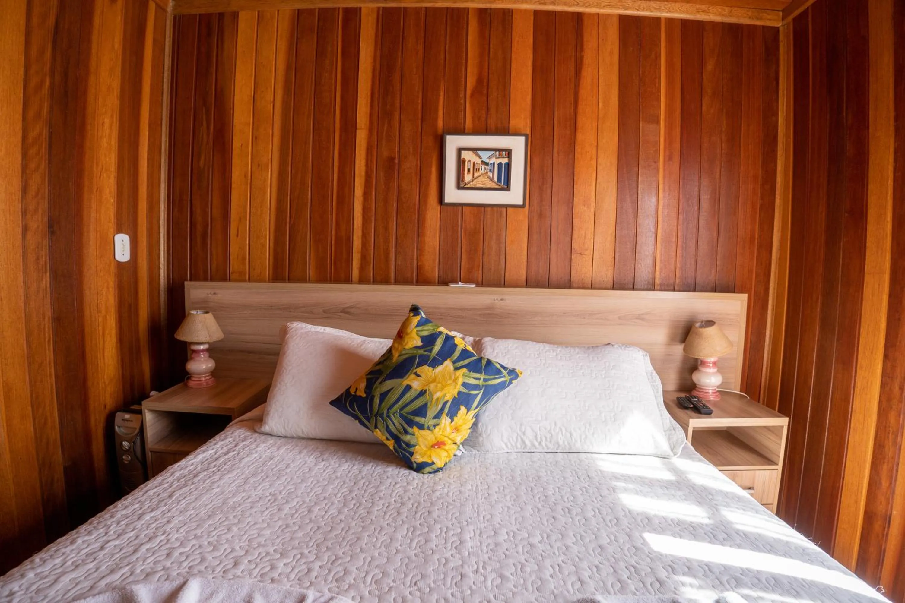 Bed in Pousada Recanto Ninho Verde Chalés