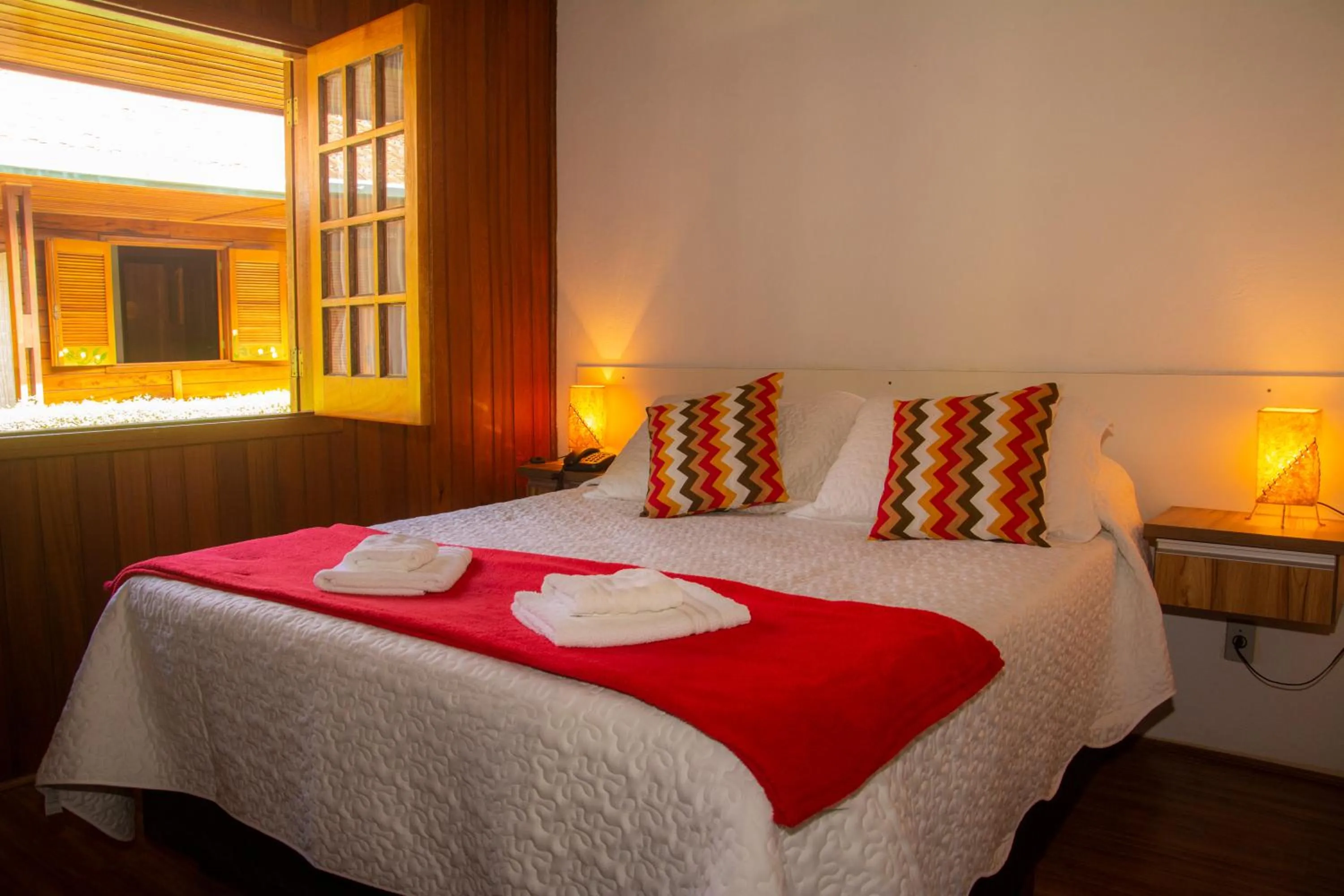 Bed in Pousada Recanto Ninho Verde Chalés