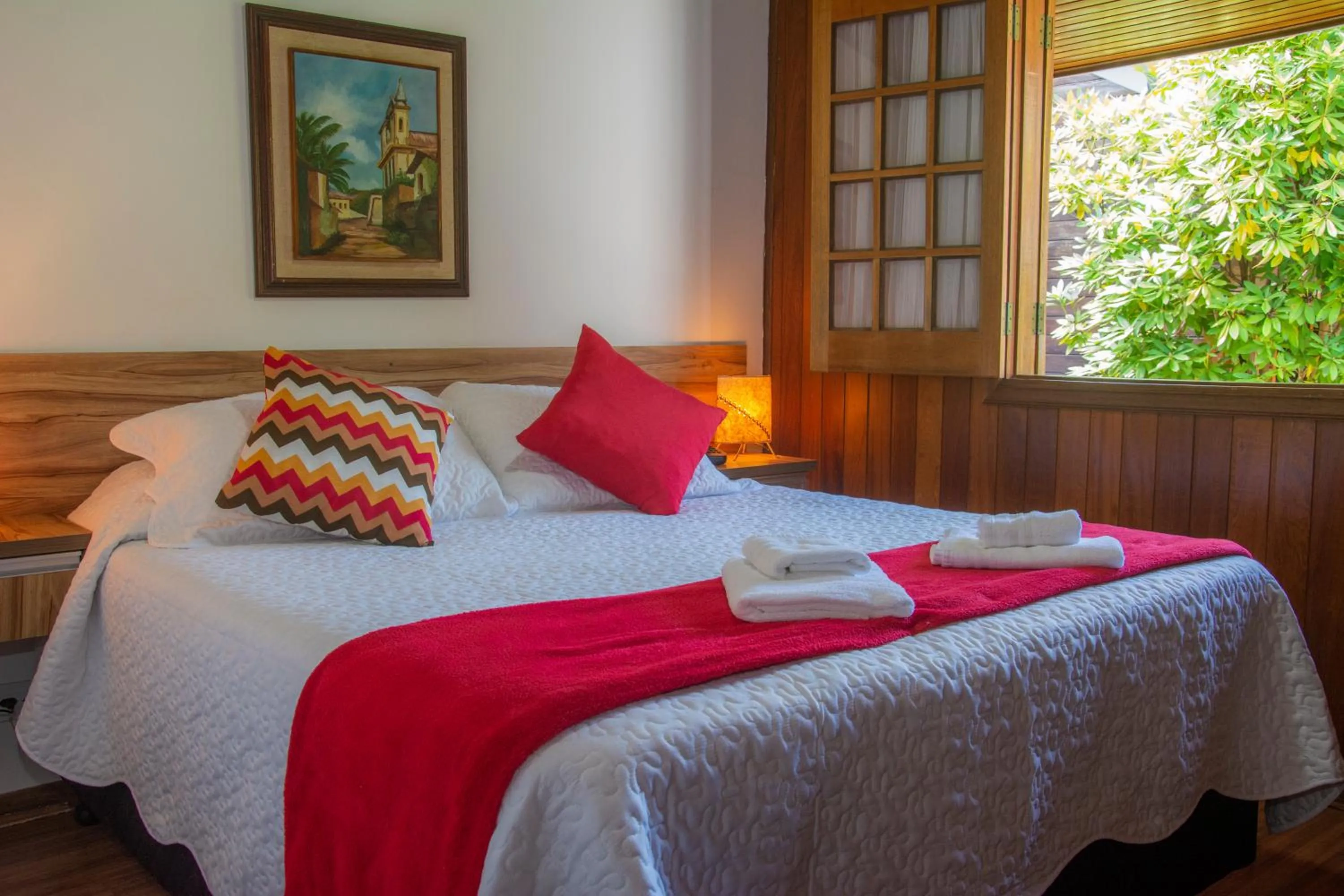 Bed in Pousada Recanto Ninho Verde Chalés