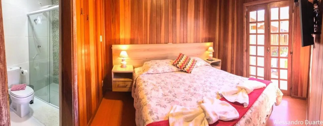 Photo of the whole room, Bed in Pousada Recanto Ninho Verde Chalés