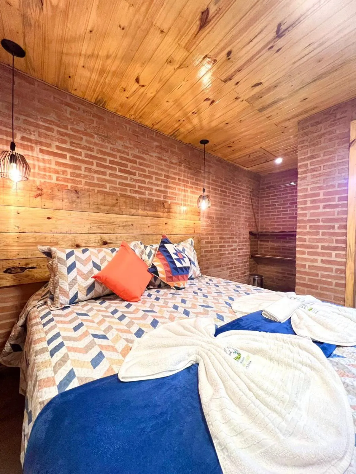 Bed in Pousada Recanto Ninho Verde Chalés