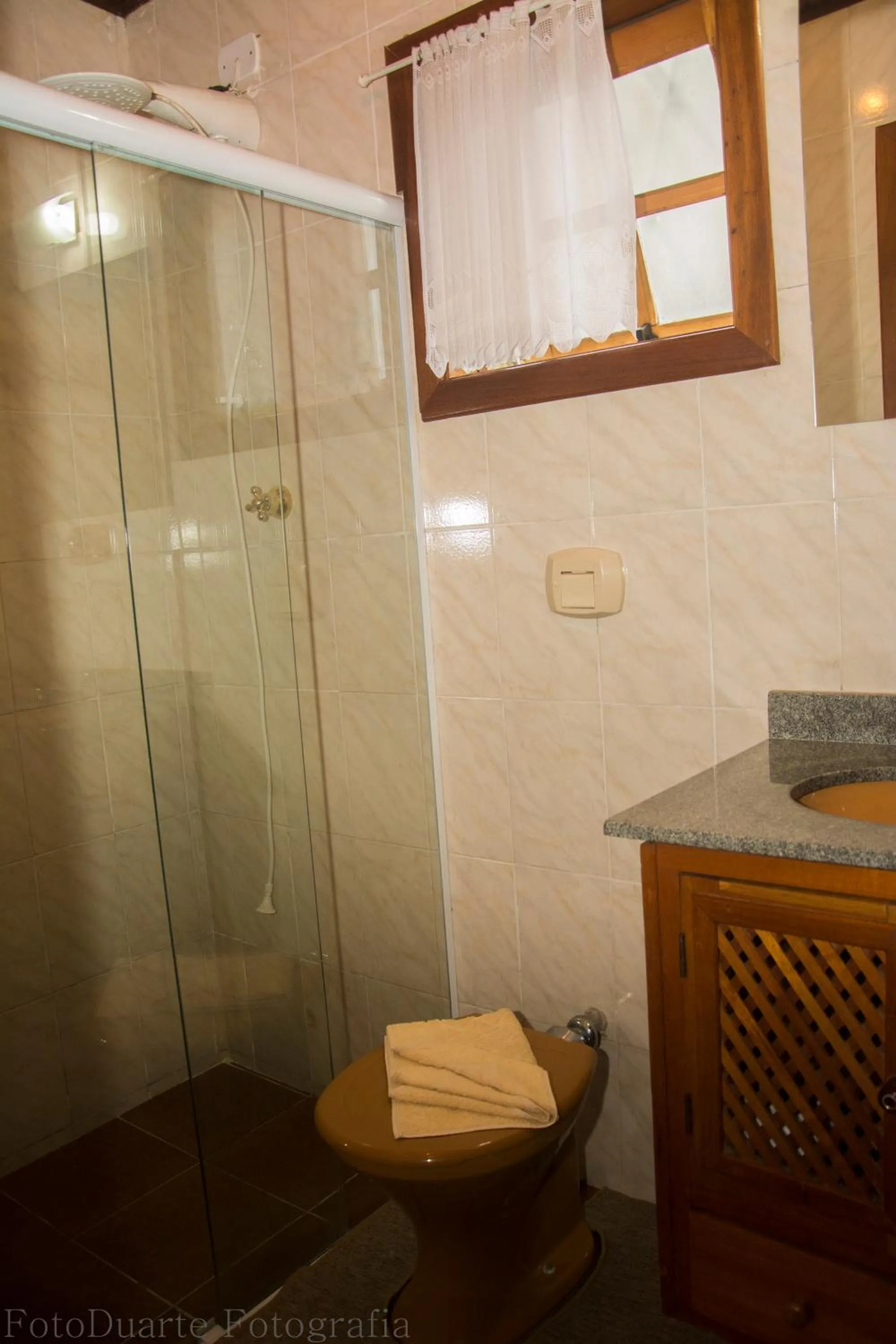 Shower in Pousada Recanto Ninho Verde Chalés