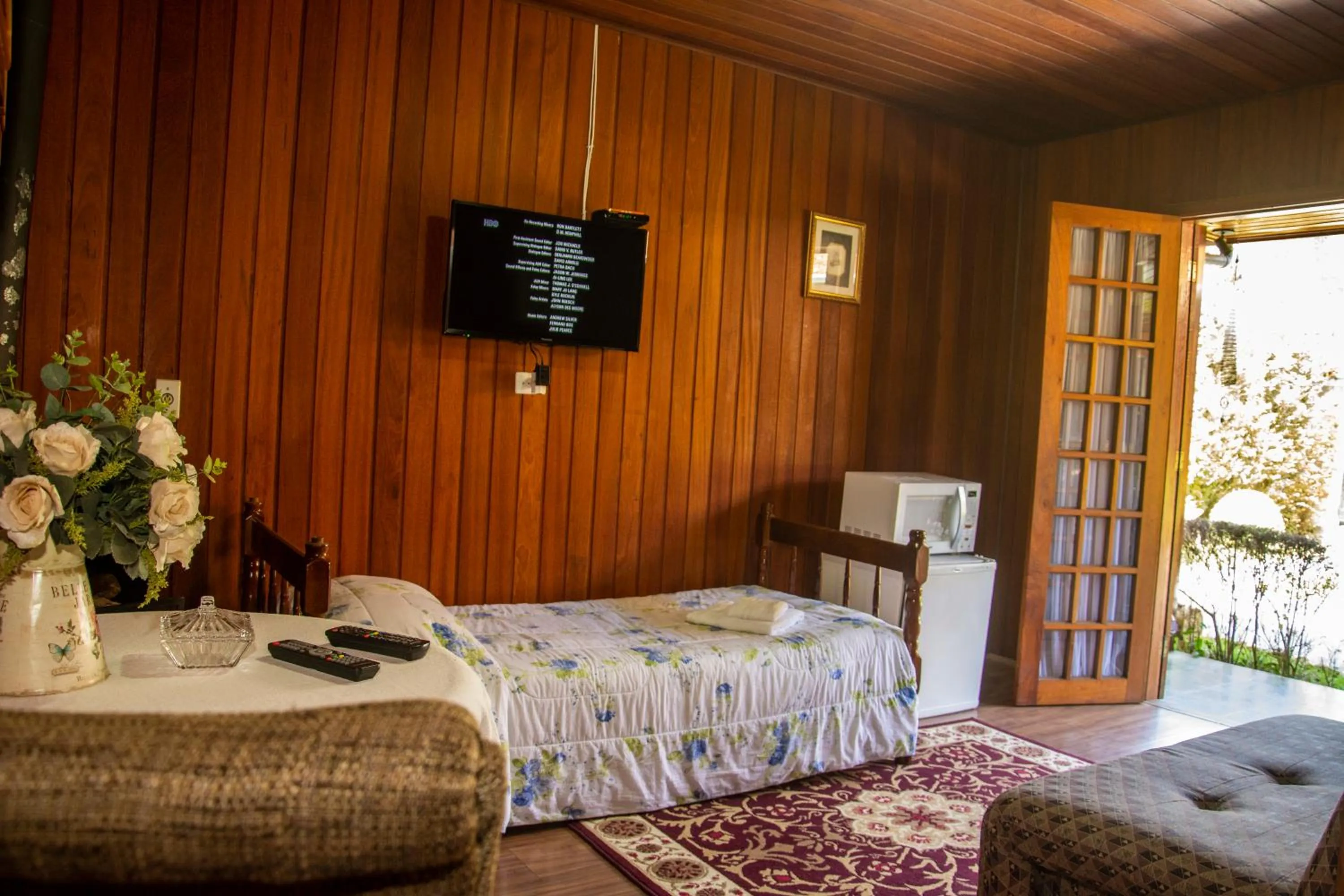 Bed in Pousada Recanto Ninho Verde Chalés