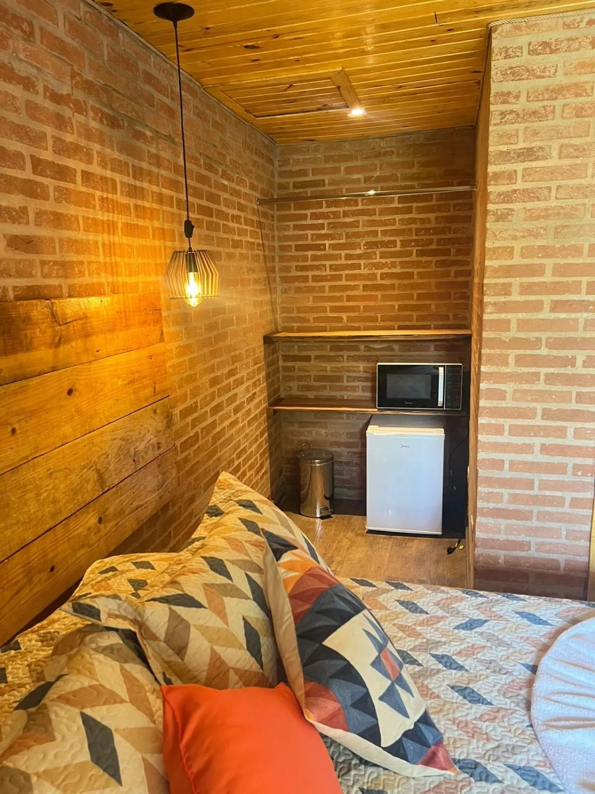 Bed in Pousada Recanto Ninho Verde Chalés