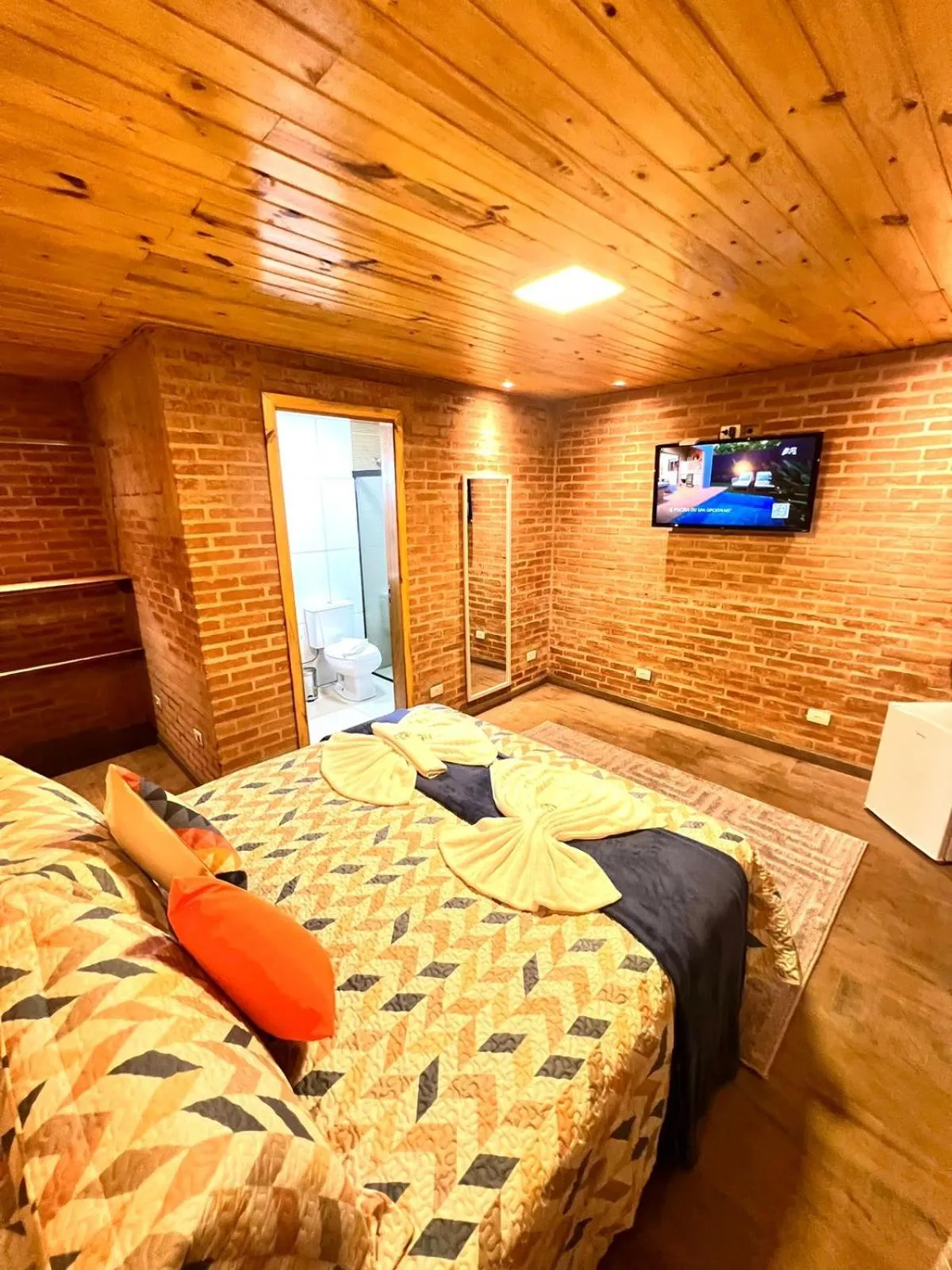 Bed in Pousada Recanto Ninho Verde Chalés