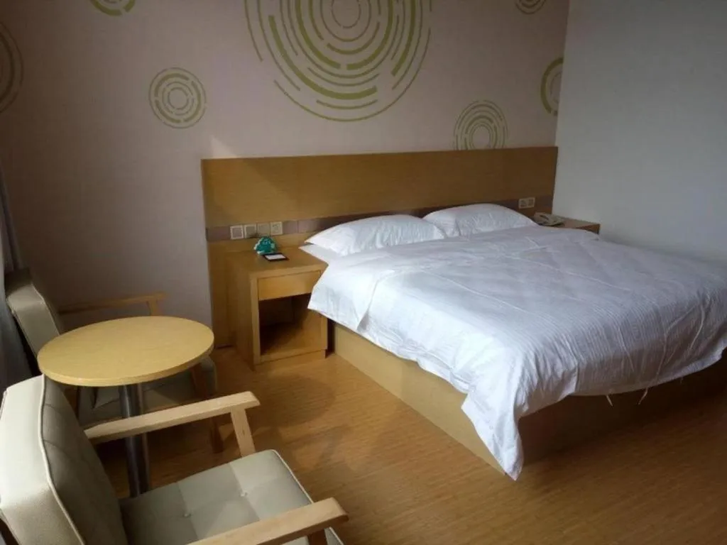 Bed in GreenTree Inn Qingdao Jiaozhou Jiaoping Road Express Hotel