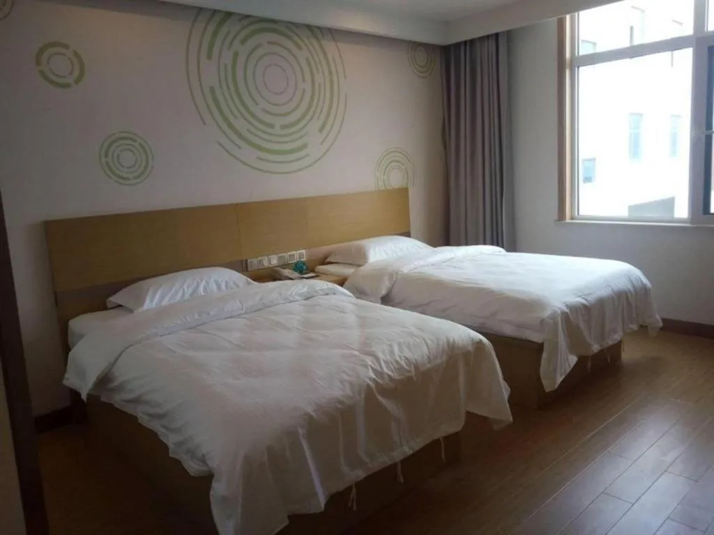 Bed in GreenTree Inn Qingdao Jiaozhou Jiaoping Road Express Hotel