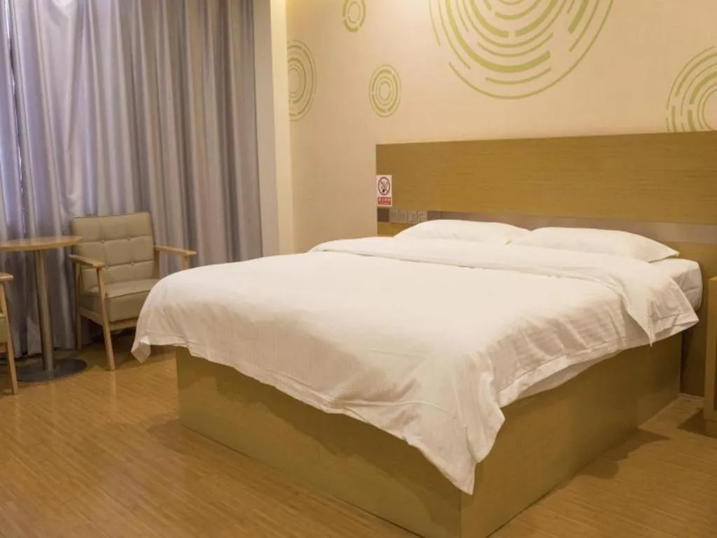 Bed in GreenTree Inn Qingdao Jiaozhou Jiaoping Road Express Hotel