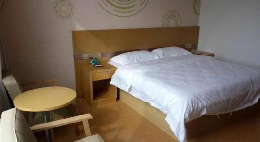 Bed in GreenTree Inn Qingdao Jiaozhou Jiaoping Road Express Hotel