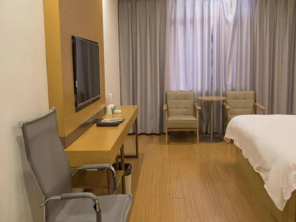 Bed in GreenTree Inn Qingdao Jiaozhou Jiaoping Road Express Hotel