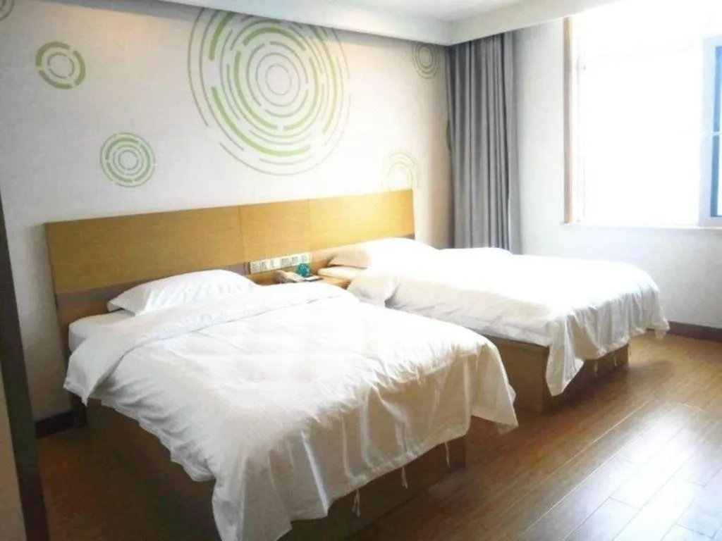 Bed in GreenTree Inn Qingdao Jiaozhou Jiaoping Road Express Hotel