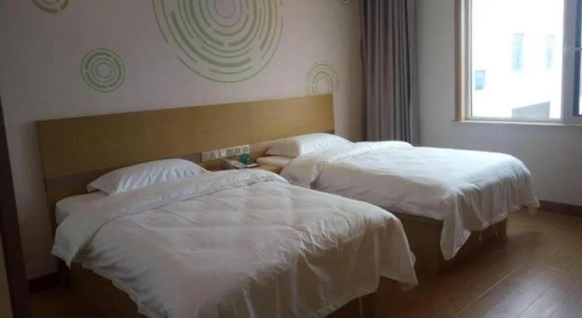 Bed in GreenTree Inn Qingdao Jiaozhou Jiaoping Road Express Hotel