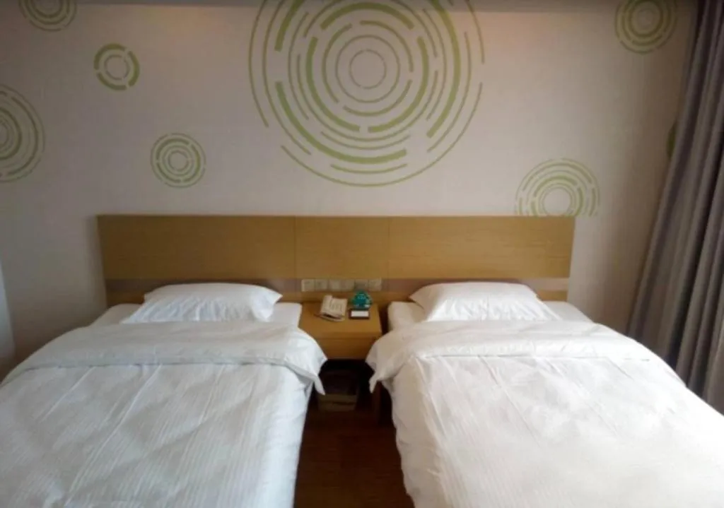 Bed in GreenTree Inn Qingdao Jiaozhou Jiaoping Road Express Hotel