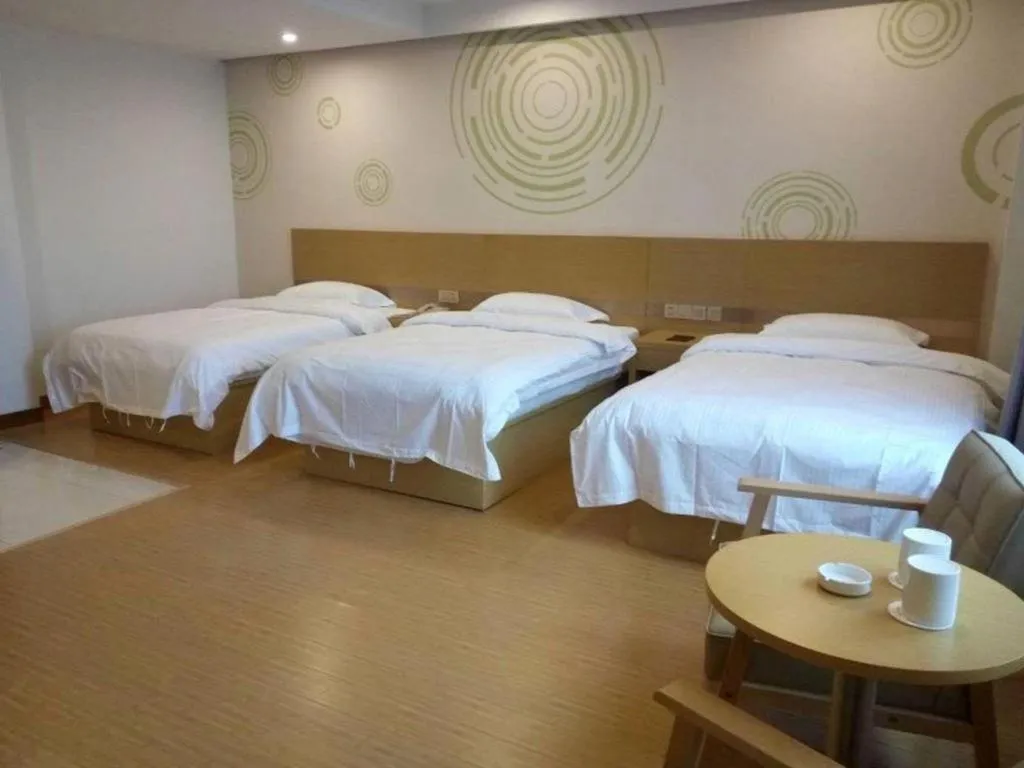 Bed in GreenTree Inn Qingdao Jiaozhou Jiaoping Road Express Hotel