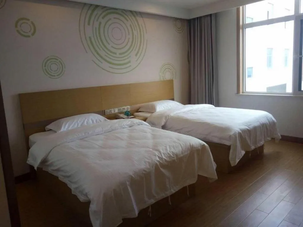 Bed in GreenTree Inn Qingdao Jiaozhou Jiaoping Road Express Hotel