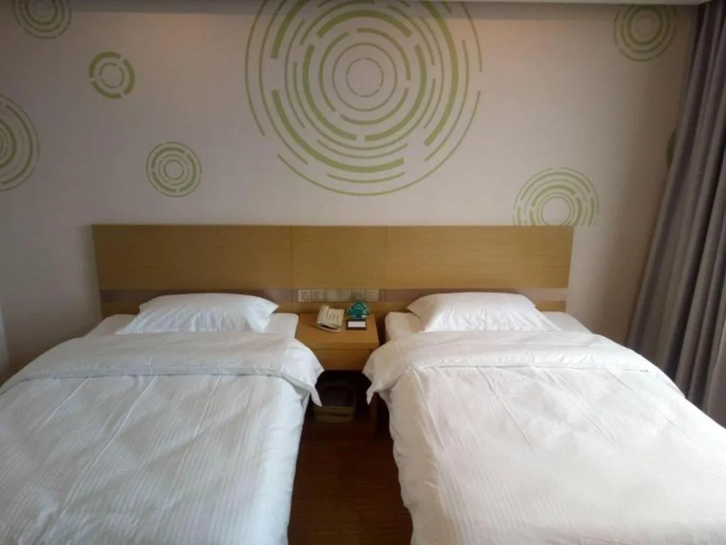 Bed in GreenTree Inn Qingdao Jiaozhou Jiaoping Road Express Hotel